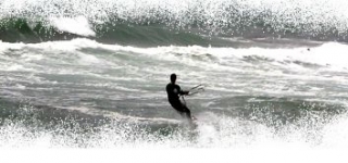 KiteSurf sobre olas 